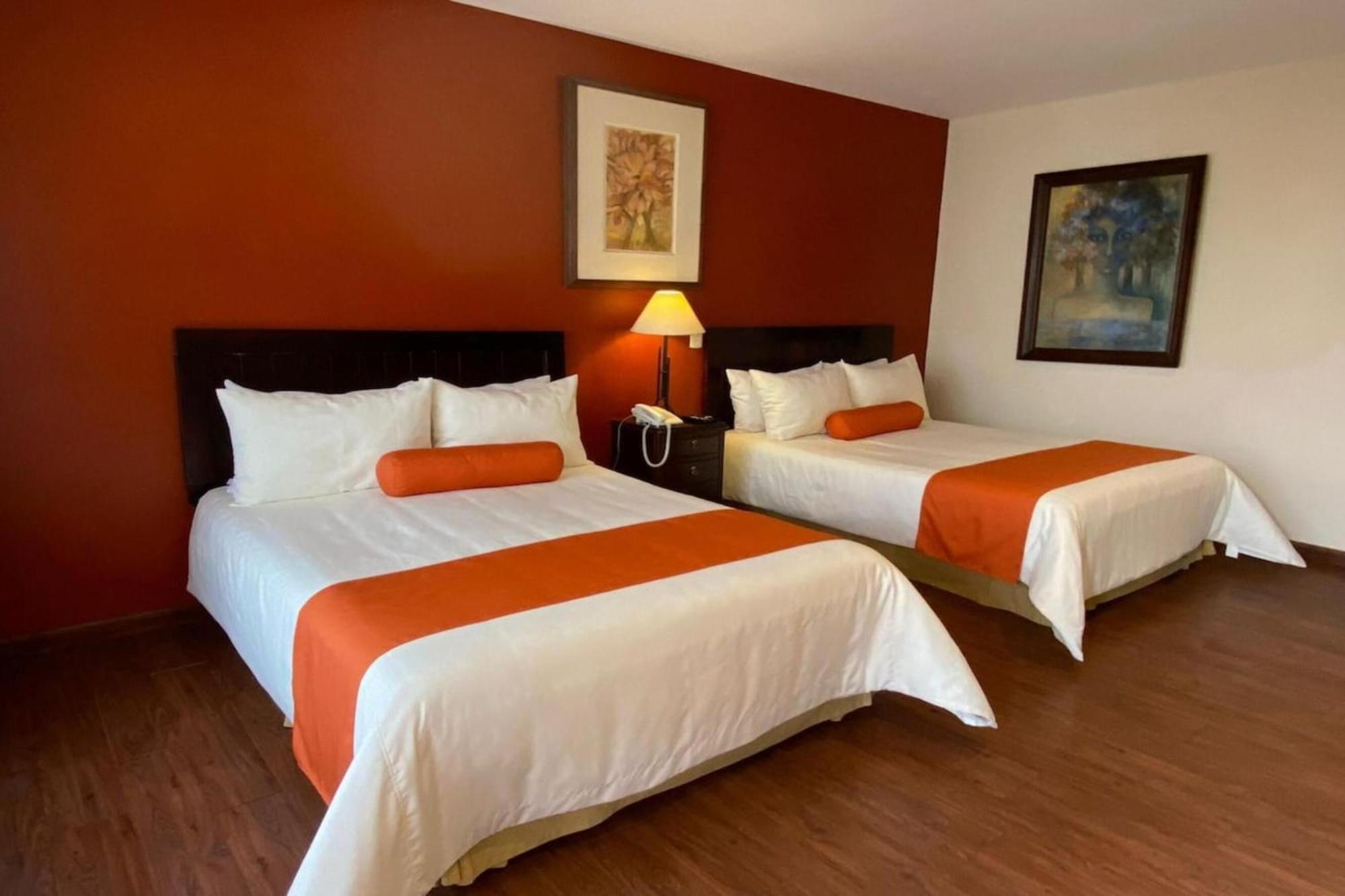 Capital O La Huerta Golf & Hotel Чолула Экстерьер фото